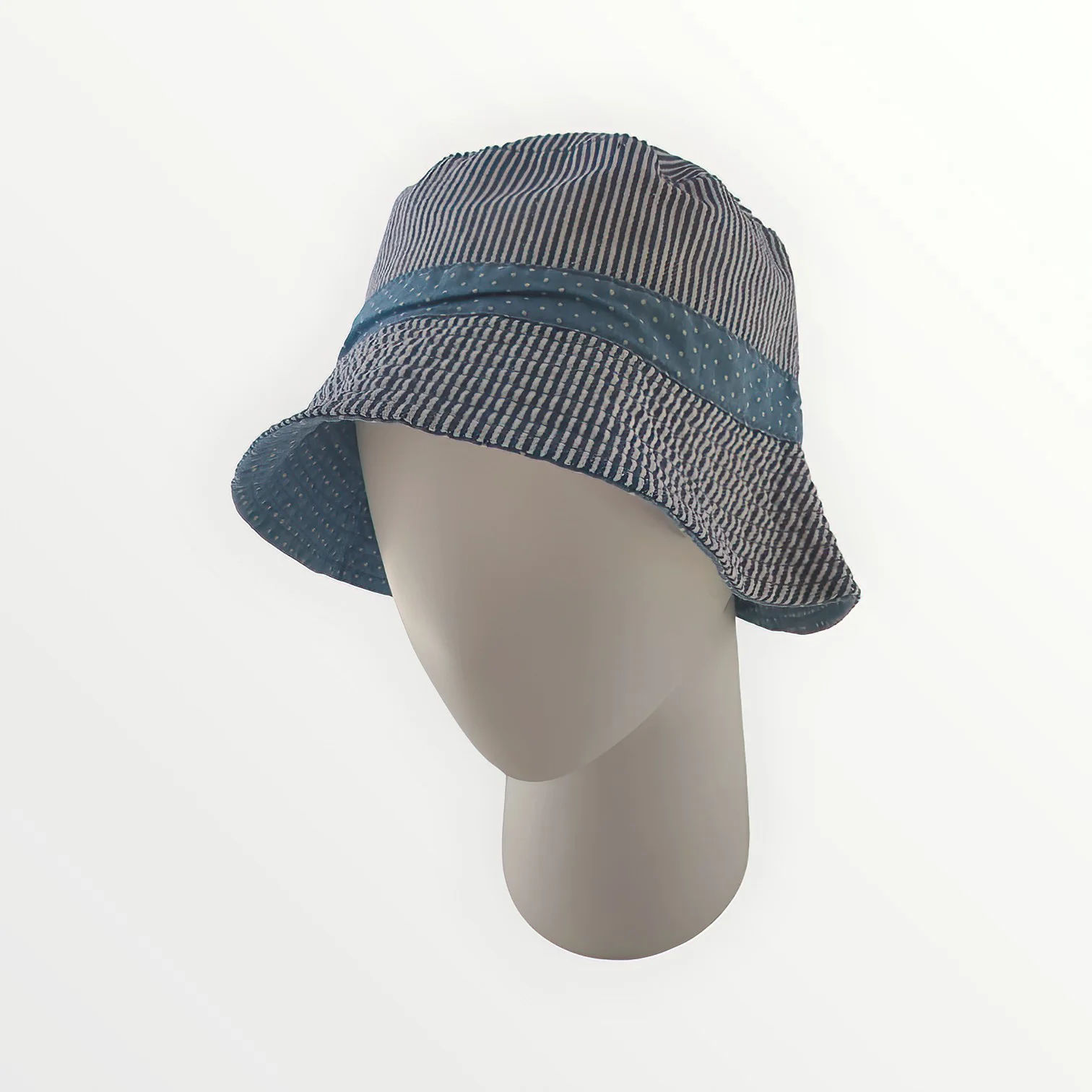 https://www.hats4heads.co.uk/wp-content/uploads/2023/06/Sun026-hats-4-heads-Reversible-Ditsy-Blue-Soft-Cotton-Bucket-Hat.webp